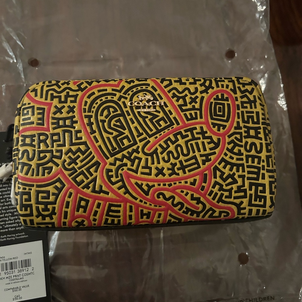 Coach Keith Haring Mickey Mouse Wallet in Yellow and Red.         Brand new!